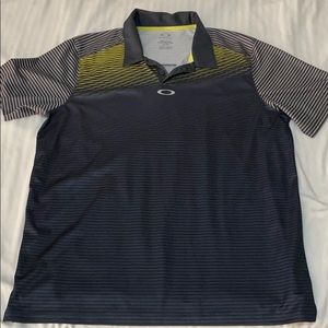 Gray and yellow Oakley dri fit golf polo